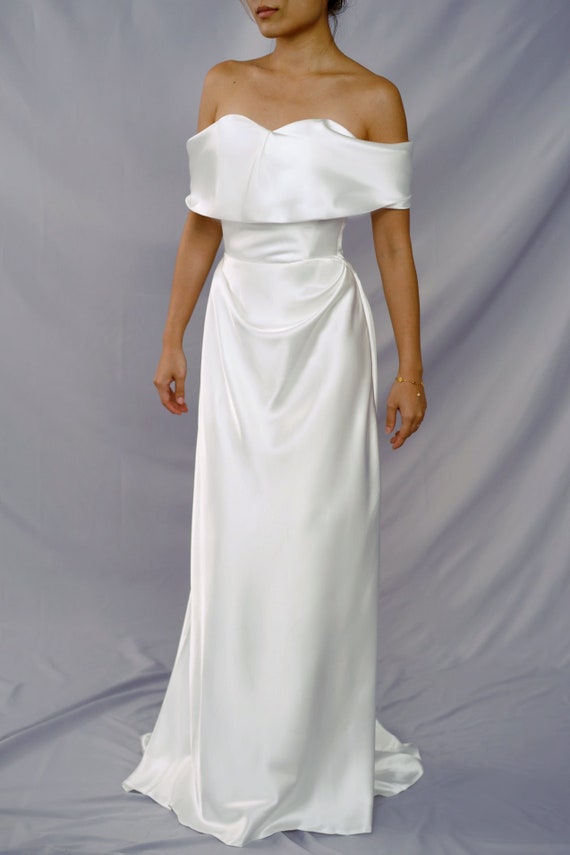 vivienne westwood wedding dress off shoulder Vivienne Westwood Bridal Comet off-shoulder silk gown Vivienne Westwood