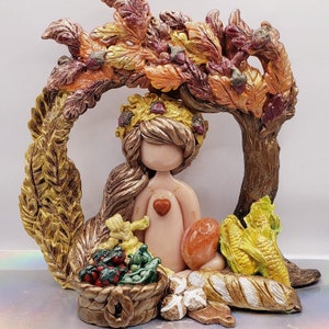 Lammas lughnasadh blessings fall autumn harvest wheat corn oak leaves bronze hair braid tomatoes green beans acorns husk doll red orange gol