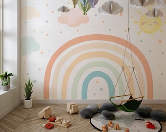 Könnte beinhalten: Ein Kinderzimmer mit einem Regenbogen-Wandbild an der Wand. Das Wandbild zeigt einen Regenbogen in Pastellfarben, Wolken und eine Sonne. Von der Decke hängt eine Schaukel und auf dem Boden liegt ein Teppich mit einer Weltkarte. Außerdem liegen Holzspielzeug auf dem Boden.