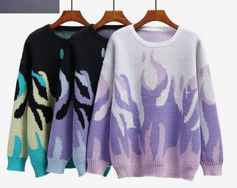 black sweater with blue flames