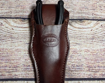 Custom Hatch Plier sheath with larger belt loop and drain hole grommet