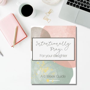 May include: A printable guide with a watercolor background in shades of pink, brown, and green. The text reads "Intentionally Pray... For your daughter. A 6 Week Guide".