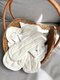 Organic Cotton Reusable Menstrual Pads, Washable Cloth Pads, Zero Waste Period Care, Sustainable Feminine Hygiene product logo
