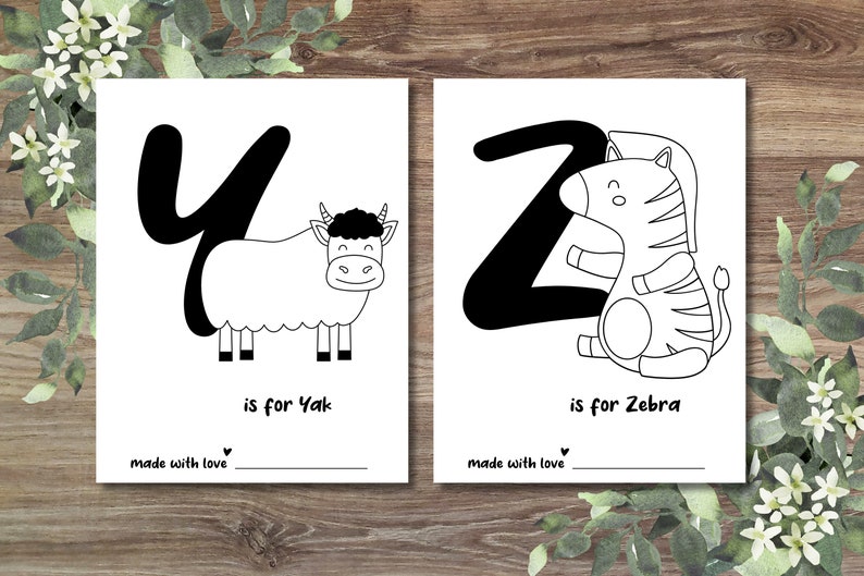 May include: Black and white printable alphabet flash cards featuring a yak and a zebra. The letter Y is for yak and the letter Z is for zebra. The cards say "is for Yak" and "is for Zebra" and "made with love".