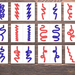 Pode incluir: Doze cart&otilde;es, cada um dividido em duas se&ccedil;&otilde;es, apresentando desenhos de linhas vermelhas e azuis. Os desenhos variam, incluindo linhas onduladas, ziguezagues e formas de cora&ccedil;&atilde;o, tudo em um fundo branco.
