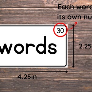 May include: A white card with a black border and the word "words" printed in large, bold, black letters. The card is 4.25 inches wide and 2.25 inches tall. A red circle with the number 30 inside is in the top right corner of the card.