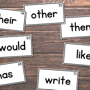 May include: A set of 10 white flash cards with black text. The words on the cards are "their", "other", "then", "would", "like", "has", "write".
