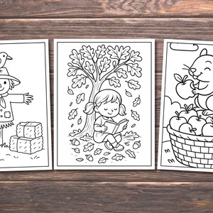 May include: Three black and white line art illustrations of autumn scenes. One shows a scarecrow with a bird, pumpkin, and hay bales. Another depicts a girl reading under a tree. The last shows a squirrel with apples.