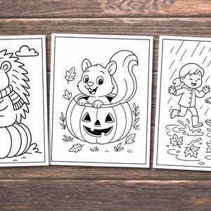 May include: Three black and white line art illustrations on white paper. The first shows a hedgehog reading a book on a pumpkin. The second shows a squirrel in a jack-o'-lantern. The third shows two children playing in the rain.