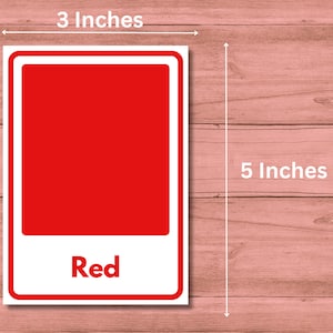 May include: A red color card with a white border. The card measures 3 inches by 5 inches and has the word "Red" printed on it.