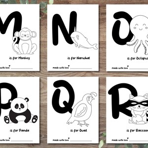 May include: Black and white printable alphabet flash cards featuring a letter and an animal for each letter. The letters are in bold, uppercase font. The animals are illustrated in a simple, cartoon style. The text "is for" and the animal name are written below each letter and animal.