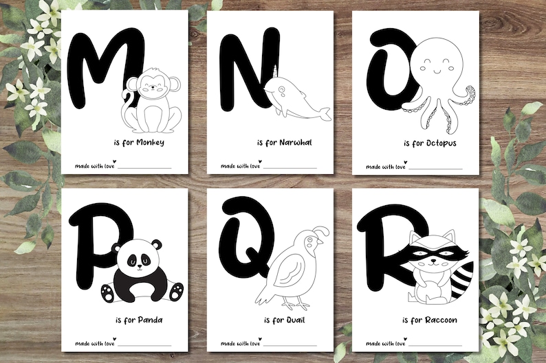 May include: Black and white printable alphabet flash cards featuring a letter and an animal for each letter. The letters are in bold, uppercase font. The animals are illustrated in a simple, cartoon style. The text "is for" and the animal name are written below each letter and animal.