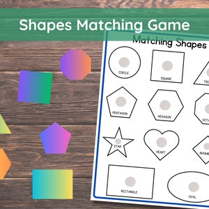 May include: A printable shapes matching game for kids. The game features 12 different shapes, including a circle, square, triangle, pentagon, hexagon, octagon, star, heart, rhombus, rectangle, and oval. Each shape is outlined in black and has a white circle in the center.