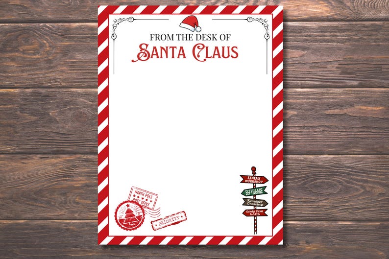 Peut inclure: Une feuille de papeterie sur le th&egrave;me de No&euml;l avec une bordure &agrave; rayures rouges et blanches. Le haut pr&eacute;sente le texte "FROM THE DESK OF SANTA CLAUS" et un bonnet de P&egrave;re No&euml;l. Comprend des timbres et un poteau indicateur.