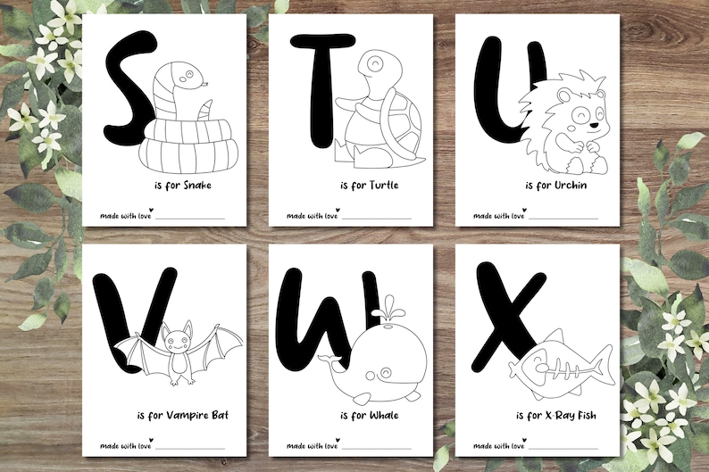 May include: Black and white printable alphabet flash cards featuring a snake, turtle, urchin, vampire bat, whale, and X-ray fish. Each card has a letter and the phrase "is for" followed by the name of the animal.