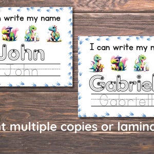 May include: Two printable worksheets featuring colorful cartoon dragons. Each worksheet has a name at the top, "John" and "Gabrielle", with dotted lines for tracing the letters. The text "I can write my name" is at the top of each worksheet.