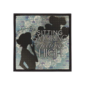 May include: Square patch with a black border featuring a silhouette of a woman smoking, with the words "SITTING SMOKING Feeling HIGH" in white script. The background is a light blue and white paisley pattern.