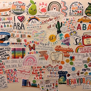 May include: A collection of colorful stickers with various designs and text related to behavioral analysis. The stickers feature phrases like "Behavior Squad," "ABA," and "Inclusion is my love language." The stickers are in various shapes, including hearts, rainbows, and speech bubbles.