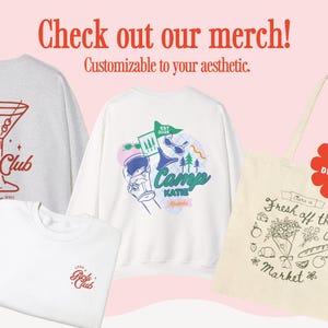 May include: A promotional image featuring various merchandise items. Included are a gray sweatshirt with a cocktail graphic, a white t-shirt and sweatshirt with graphics, and a tote bag. Text on the items includes "Girls Club" and "Camp Katie". A red flower-shaped sticker reads "Bulk Discounts."