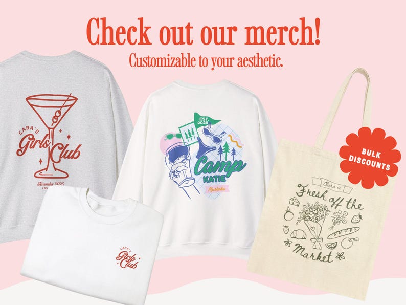 May include: A promotional image featuring various merchandise items. Included are a gray sweatshirt with a cocktail graphic, a white t-shirt and sweatshirt with graphics, and a tote bag. Text on the items includes "Girls Club" and "Camp Katie". A red flower-shaped sticker reads "Bulk Discounts."