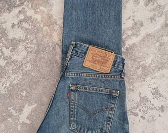 Vintage 1990's Levi's 595 Jeans 24x27 medium blue