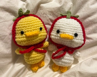 Crochet Duck Plushie wearing (Frog, Bee, Strawberry) Hat