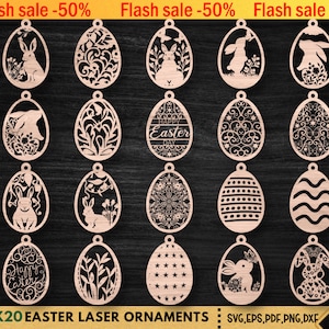 May include: Twenty laser cut wooden Easter egg ornaments in various designs, including bunnies, floral patterns, and the words "Happy Easter Day".