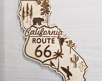 Adorno de la Ruta 66 de California, Camino Madre, grabado y cortado.