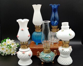 Vintage Miniature Oil/Kerosene Lamps; Milk Glass with Applied Pink Roses; Blue Glass with Clear or White Frosted; and Luster Finish Souvenir