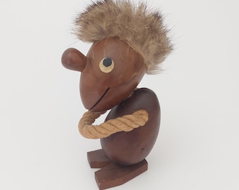 Figura de madera de optimista