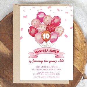 May include: Pink and gold birthday party invitation with a watercolor illustration of balloons and the text "MARISSA SMITH is turning ten years old!"  Join us to celebrate Saturday, April 10th at 2pm. The Birthday Place 123 Birthday Rd, Orlando 12345 RSVP to Lainy at 123-456-7890