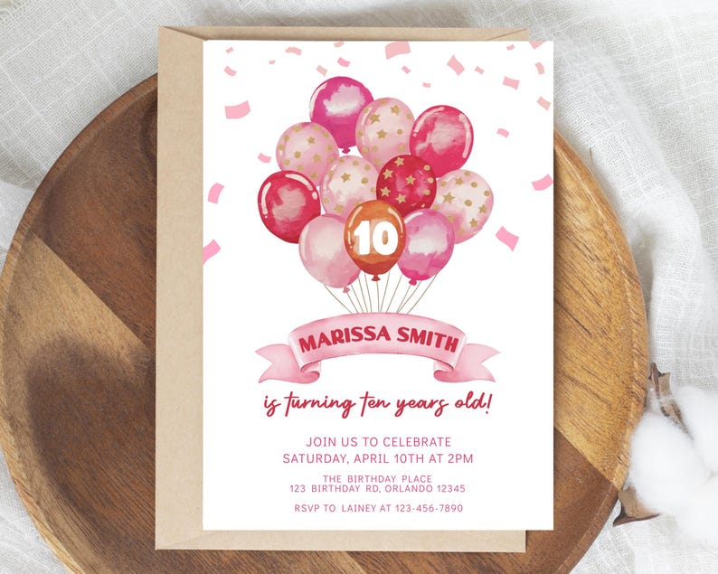 May include: Pink and gold birthday party invitation with a watercolor illustration of balloons and the text "MARISSA SMITH is turning ten years old!"  Join us to celebrate Saturday, April 10th at 2pm. The Birthday Place 123 Birthday Rd, Orlando 12345 RSVP to Lainy at 123-456-7890