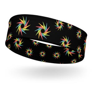 May include: Black headband with a repeating pattern of colorful, multi-pointed starbursts.