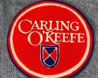 Écusson en feutre brodé « Carling O'Keefe » vintage