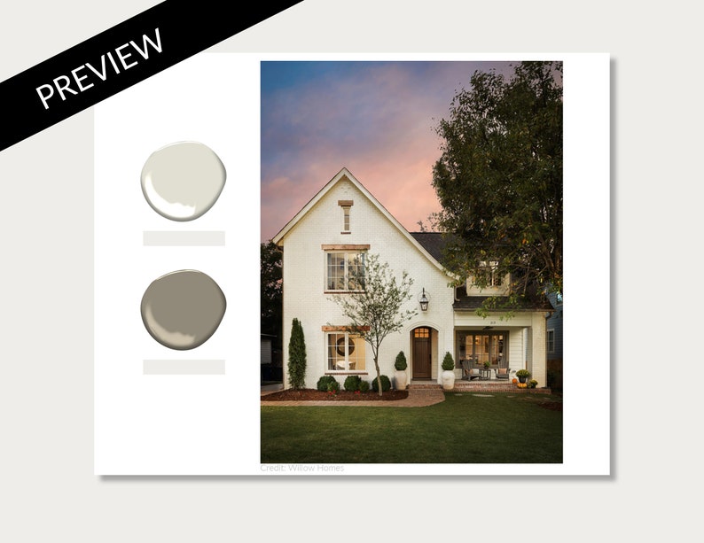 May include: A white two-story house with a brick facade and a brown door. The house has a large front porch with a white railing and a green lawn. The sky is a soft pink and orange color. Credit: Willow Homes.