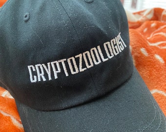 Cryptozoologist embroidered dad hat, cryptid hunter hat, Bigfoot enthusiast hat, funny gift for cryptid lover, monster hunter