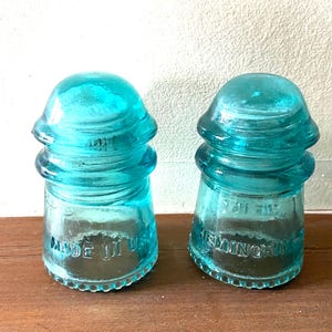 Antique blue aqua  glass insulators HEMINGRAY - 9,  Set of two, height -  3 3/4&quot;  x 2 1/4&quot; diameter at opening, , drip points on skirt