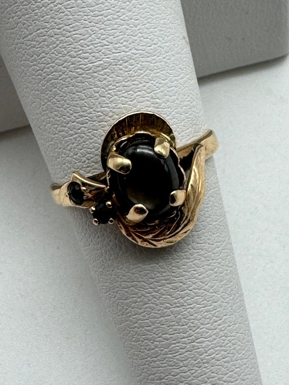 14k Yellow Gold Star Sapphire Ring With Black Diamond Accents