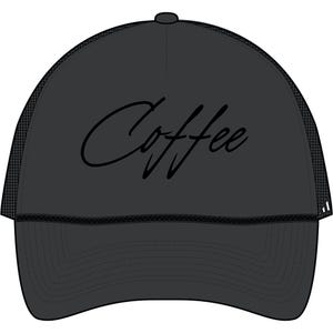 May include: A charcoal gray trucker hat with a curved brim and mesh back. The word "Coffee" is scripted across the front panel in black. The hat has a button on top and a stitched brim.