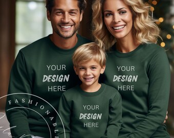 May include: A family of three wearing matching green sweatshirts with the text "Your Design Here" on each. The father is on the left, the mother is on the right, and the child is in the middle.