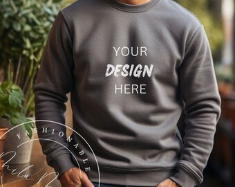May include: A grey sweatshirt with the text "YOUR DESIGN HERE" printed on the front.