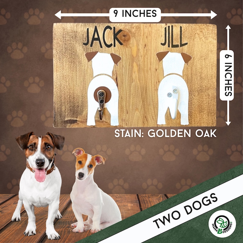 Personalized dog leash holder featuring two painted Jack Russell terrier butts with metal hooks for tails. Shown next to a photo of two real Jack Russells for comparison. Handmade wood sign measures 9x6 inches. Custom painted to match your dogs’ breeds and colors. A unique and fun gift for dog lovers or pet parents. Perfect wall decor for leash and collar storage.