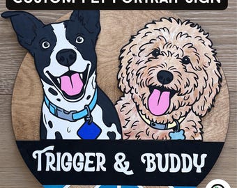 May include: Custom pet portrait sign featuring two dogs with their names, "Trigger & Buddy." The sign is round with a wooden background. One dog is black and white, the other is tan. The sign has a black banner with white text and blue and white geometric design.