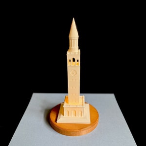 Front view of glowing UNC Bell Tower light, 3D printed graduation gift