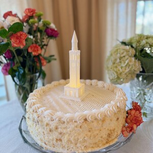 The UNC Tower cake topper, shown on a graduation cake for a UNC student.