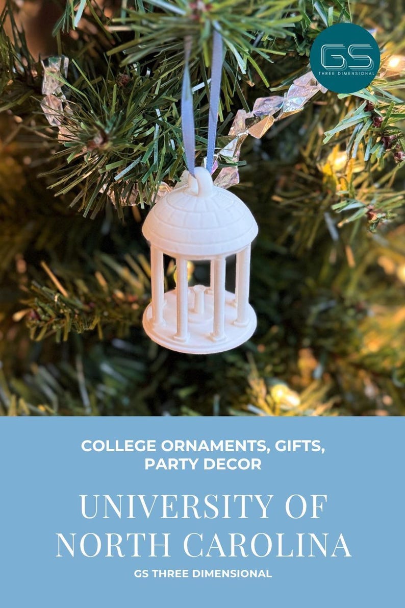 3D printed ornament of the UNC Old Well building, a detailed miniature replica, displayed as elegant UNC holiday décor.