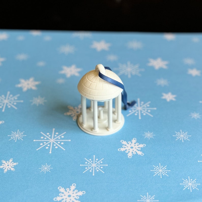 Top view of the UNC Old Well ornament.
