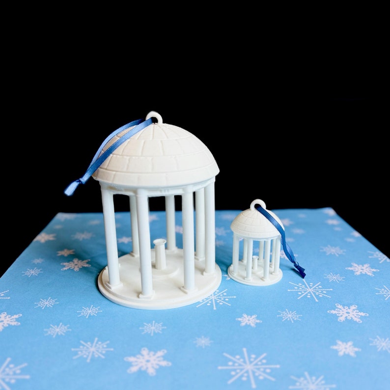 The large andsmall UNC old well ornaments, shown side by side.