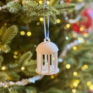 The UNC Old Well ornament on a University of North Carolina tree.