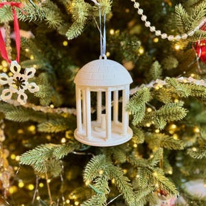 Front view of the UNC ornament, shown on a Christmas tree for UNC fans.